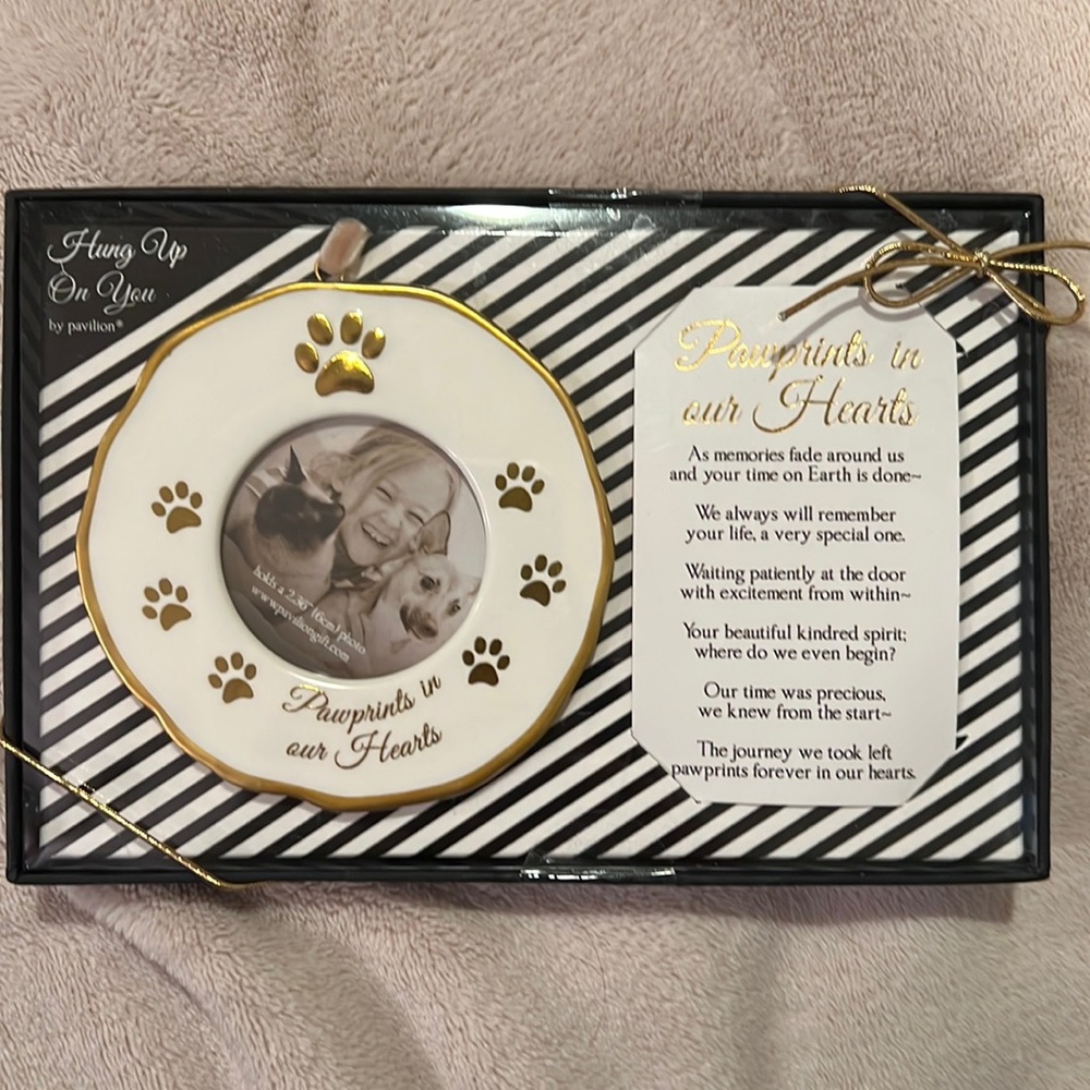 Paw prints in our heart ornament. Brand new in box